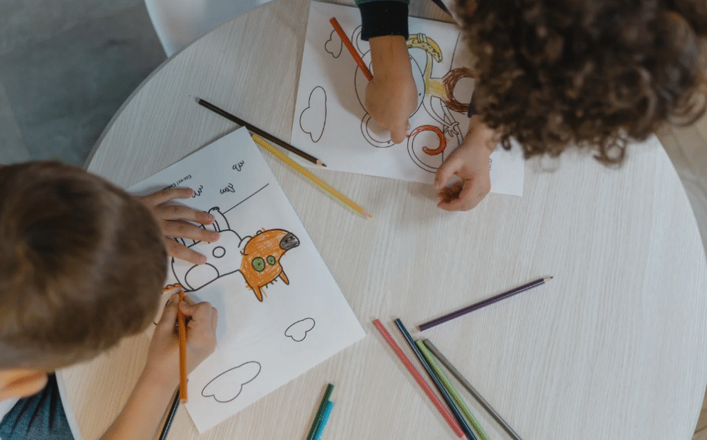 Children are drawing pictures that they like.