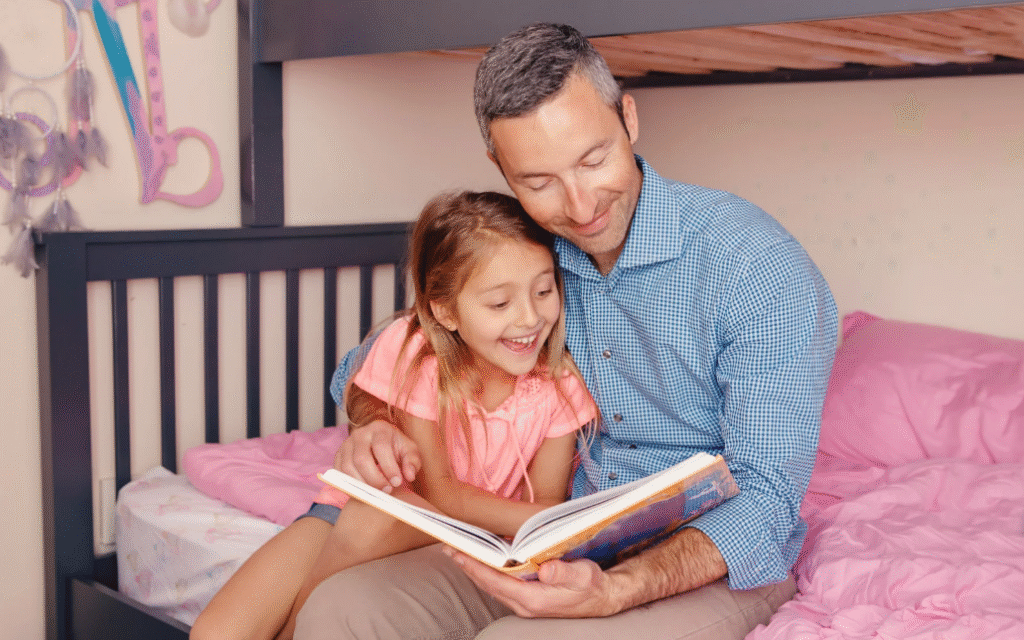 A father and his son are discussing a book.
